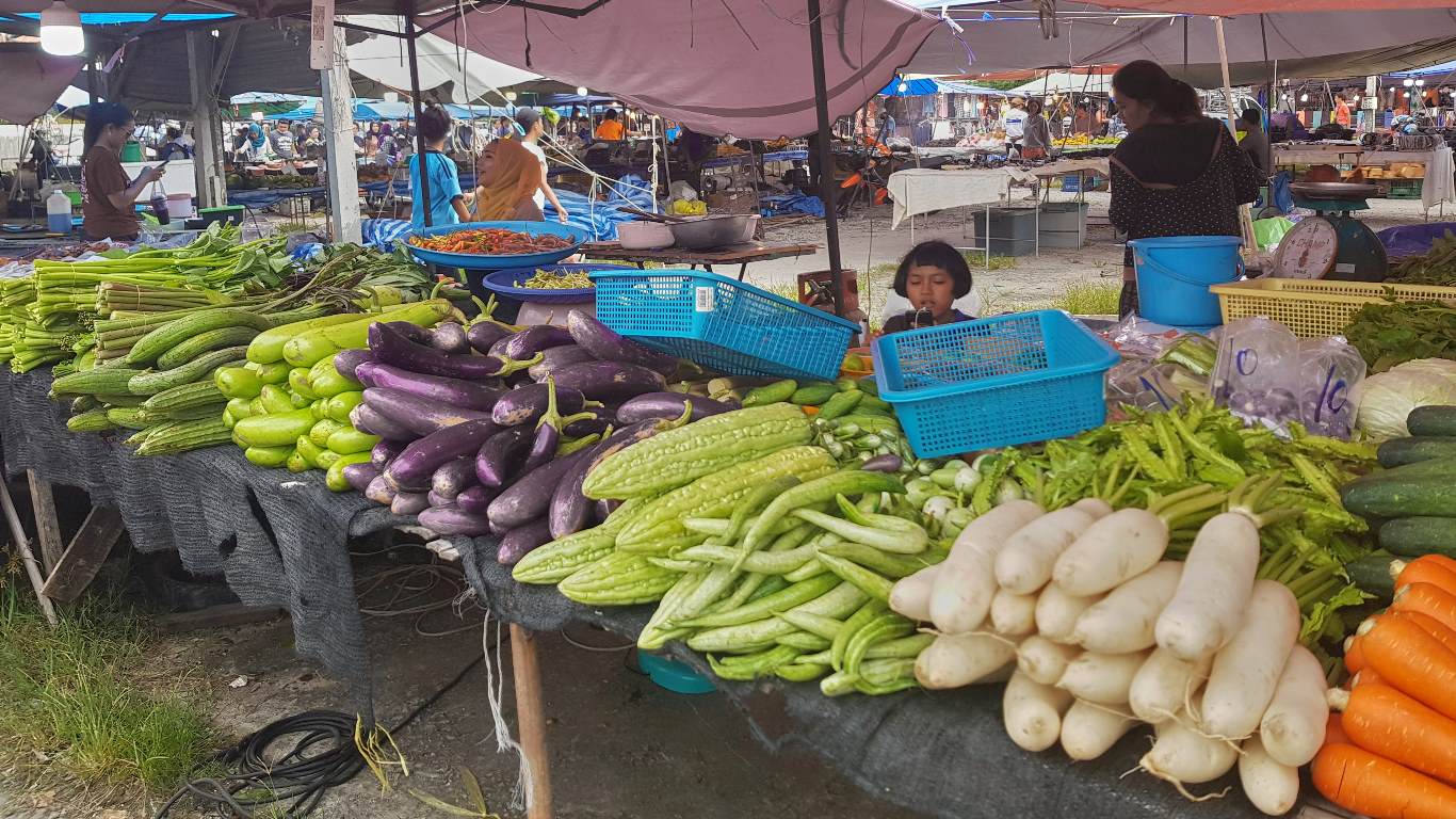 Coloured vegies on market stall