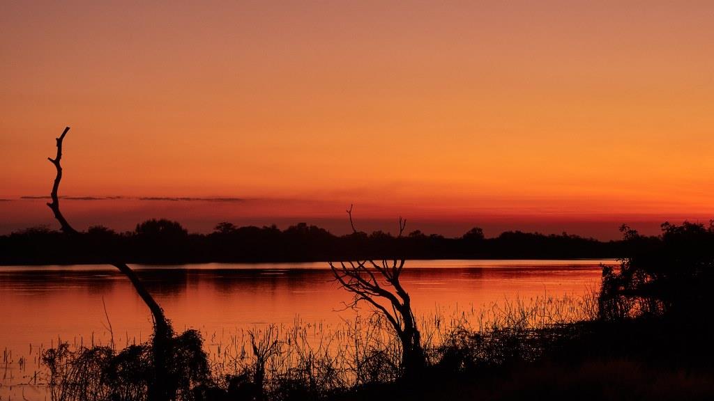 Mary River Sunset over water, very orange